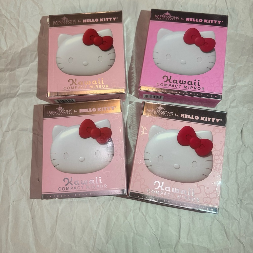 4 x hello kitty compact mirror